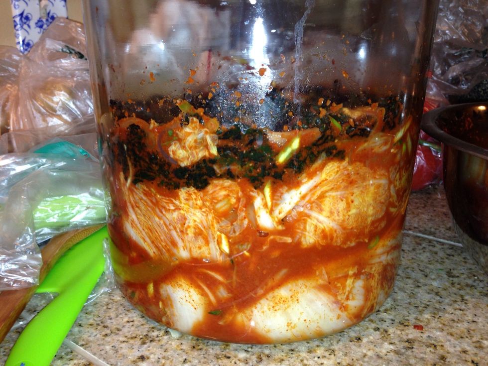 Layer in glass container and be sure to push out ALL air pockets. Make sure juice covers the top layer to inhibit the wrong types of microbial growth. Cover & place on a tray to catch any overflow.