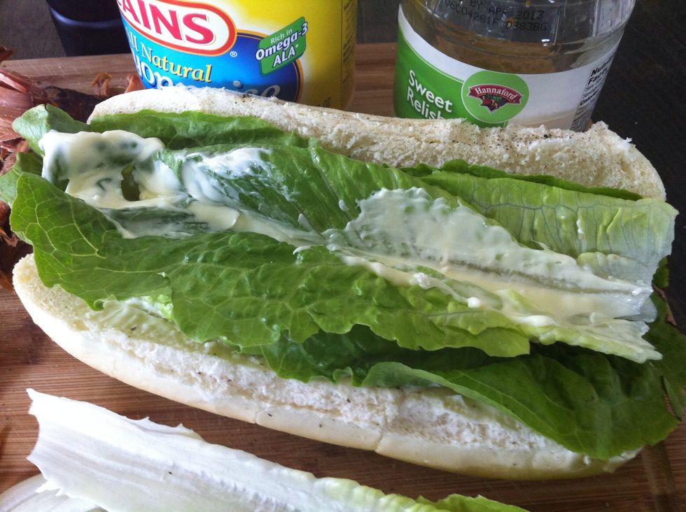 Layer in lettuce.  Not to much or you won't have room for the rest.   Spread a line of mayo over that.