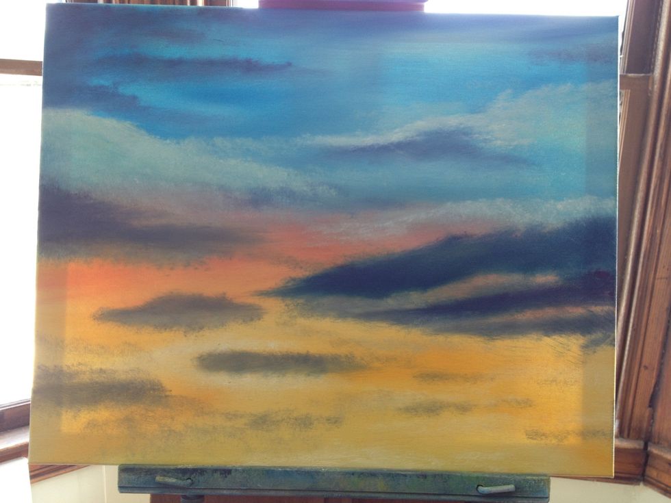 Layer in some white clouds the same way, playing off of the darker clouds. When done, VERY LIGHTLY take a clean brush and blend with horizontal strokes. There's your sunset. Ready for the seagull?