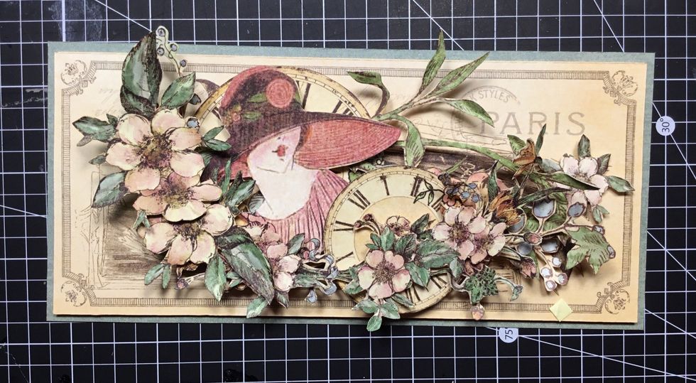 Layer larger fussy cut flowers as shown.