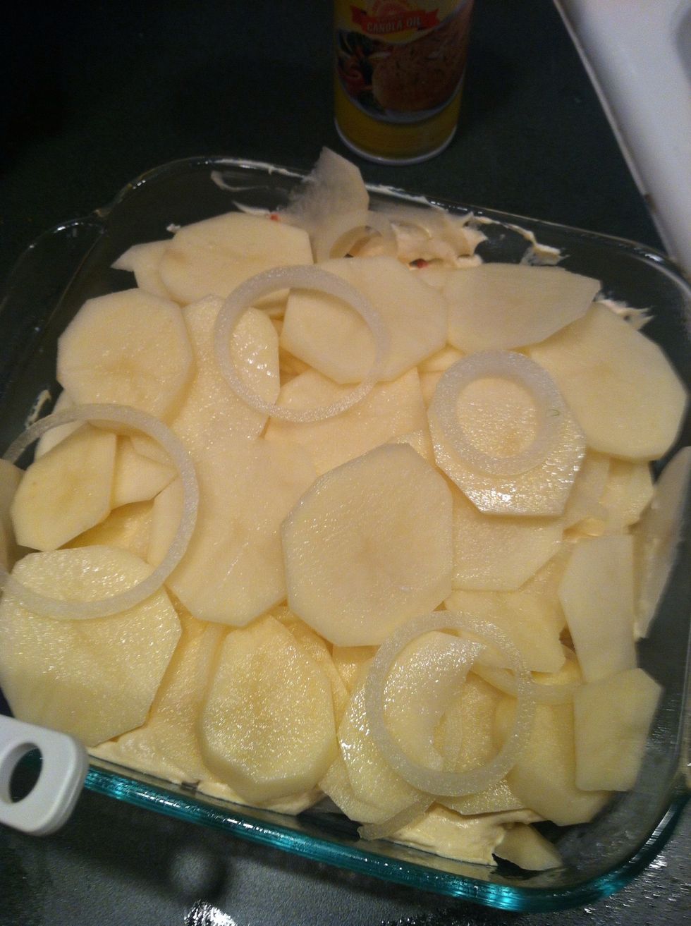 Layer more potatoes and onions