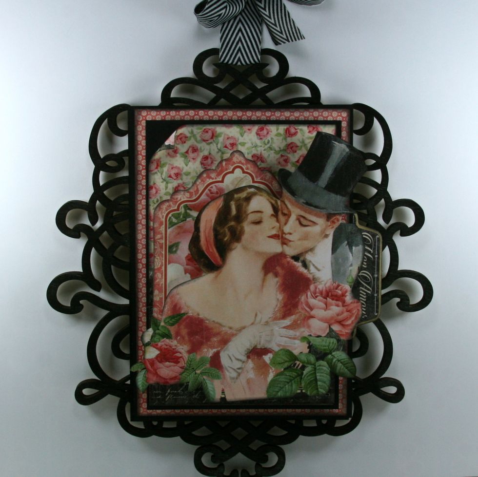 Layer on the fussy cut couple image using foam spacers.