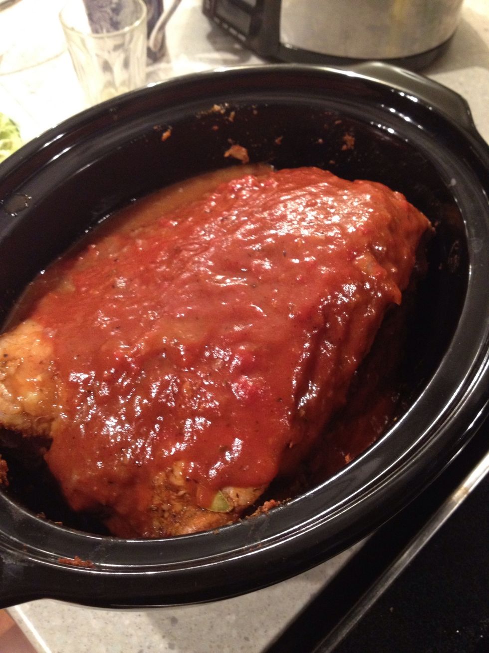 Layer onions on bottom of slow cooker. Add the pork and the sauce on top.