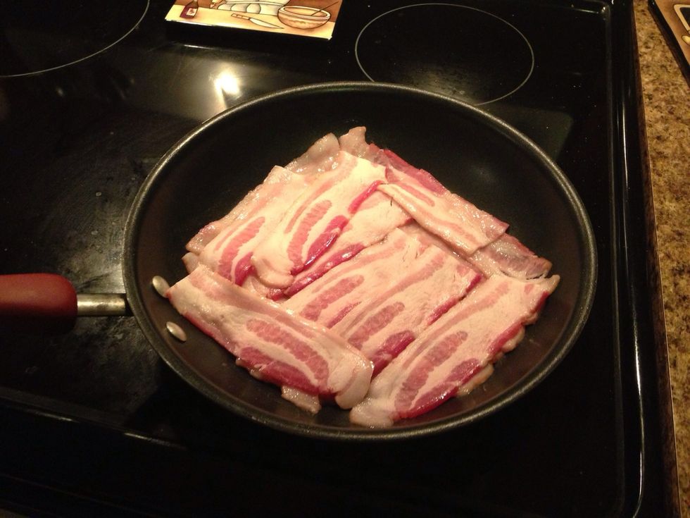 Layer the bacon in your pan.