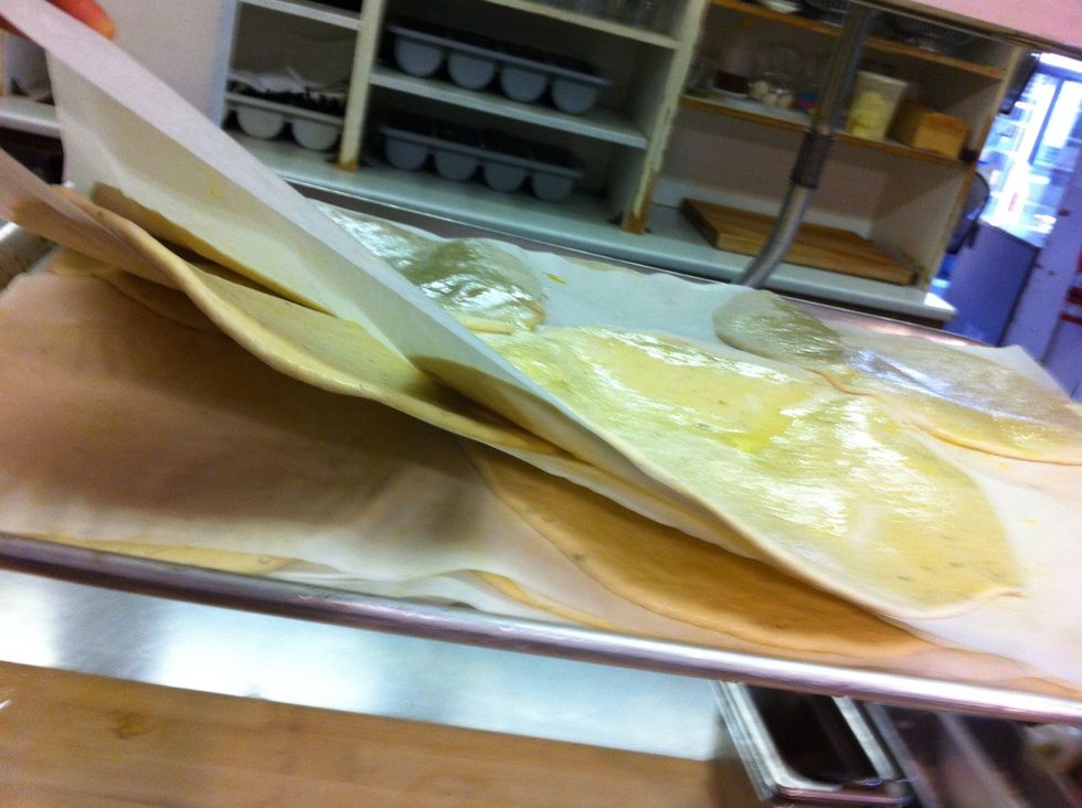 Layer the flatbreads offset from each other if you can so they're not all completely one on top of the other. This helps them freeze better.  And parchment between each. And into the freezer til stiff