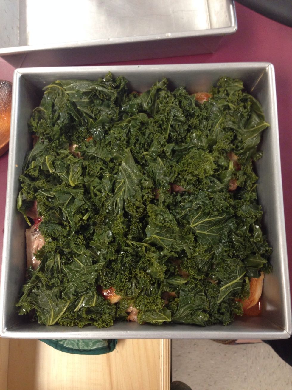 Layer the kale on top of the pork and bake for 20 minutes