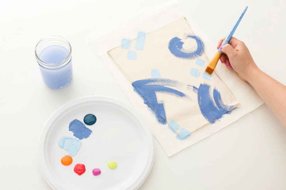 Layer up your colors in different sized strokes and shapes, making sure to mix up some dark, some light, and some bright colors.