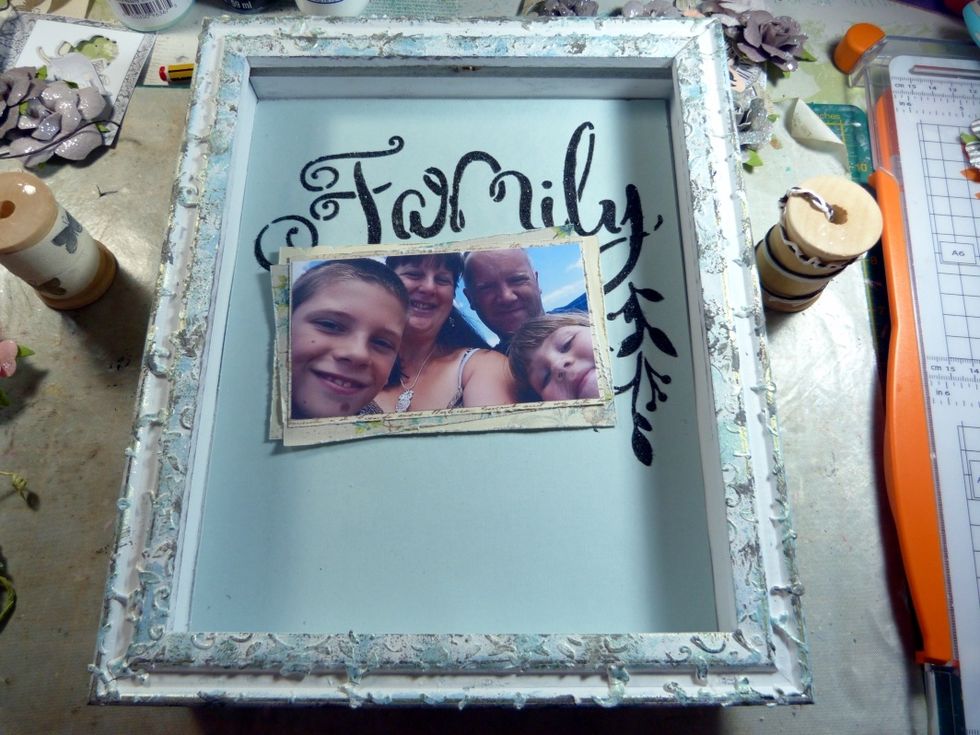 Layer up your photo with 2 pieces of distressed pattered paper from the main kit, making the layers slightly wonky. Fix onto box.