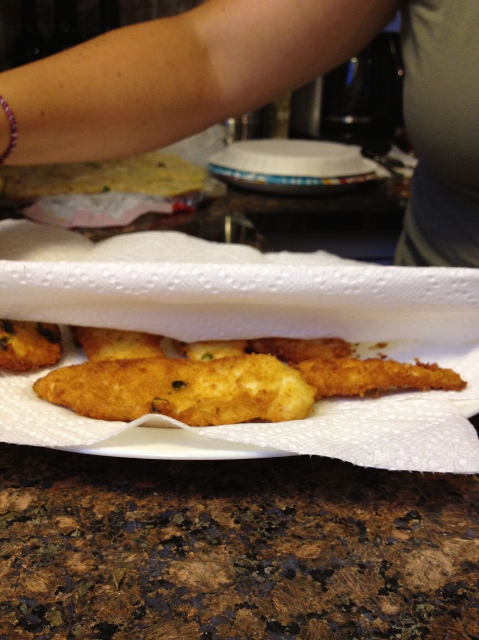 Layer with paper towels & stack the cooked chicken