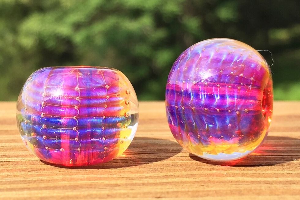 Layering Rhea, lightly reduced Phoebe, and encasing with Zephyr can produce a hot pink.