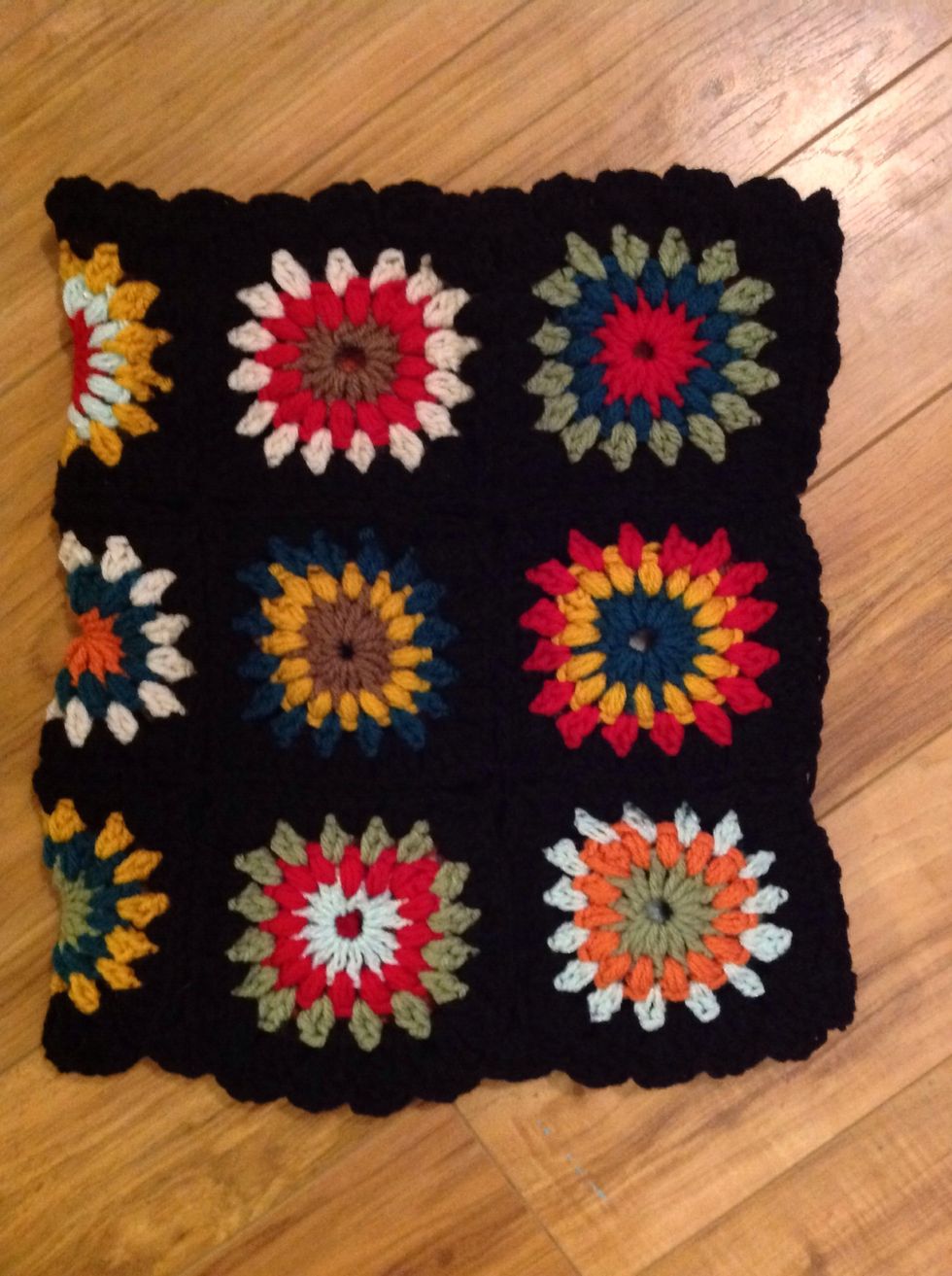 Laying flat. I did a ruffle along the edge. 3dc in space, skip 1, sl st, repeat.