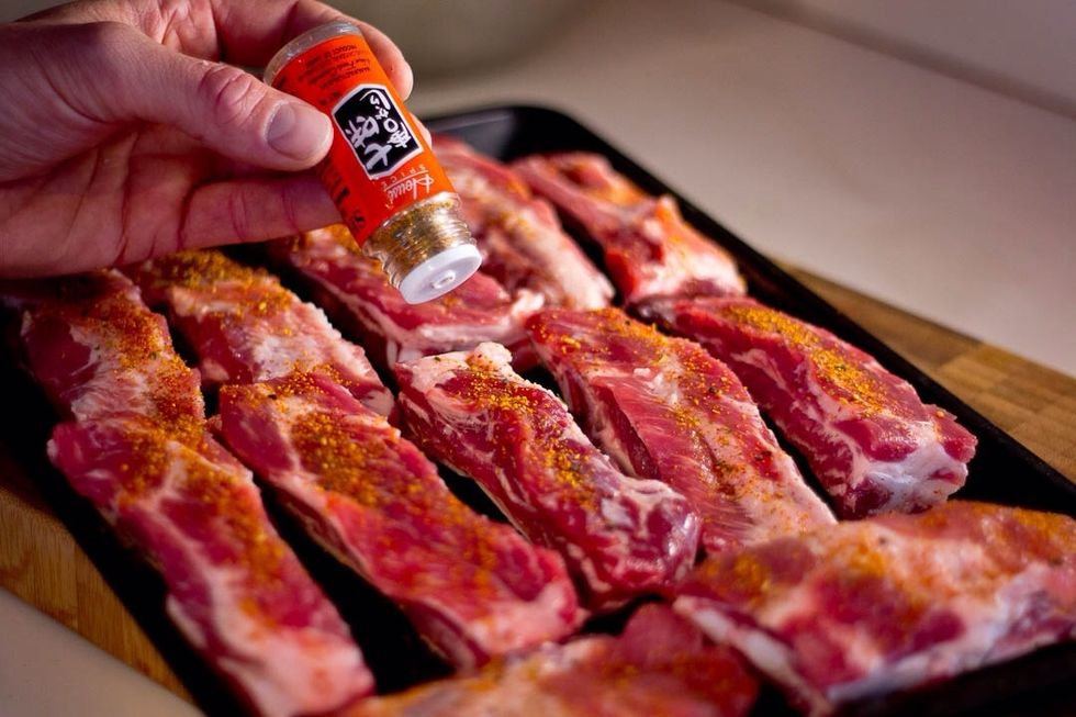 Layout the ribs on a baking sheet and sprinkle with the the Togarashi. Place them in the oven(450F) on the top rack.