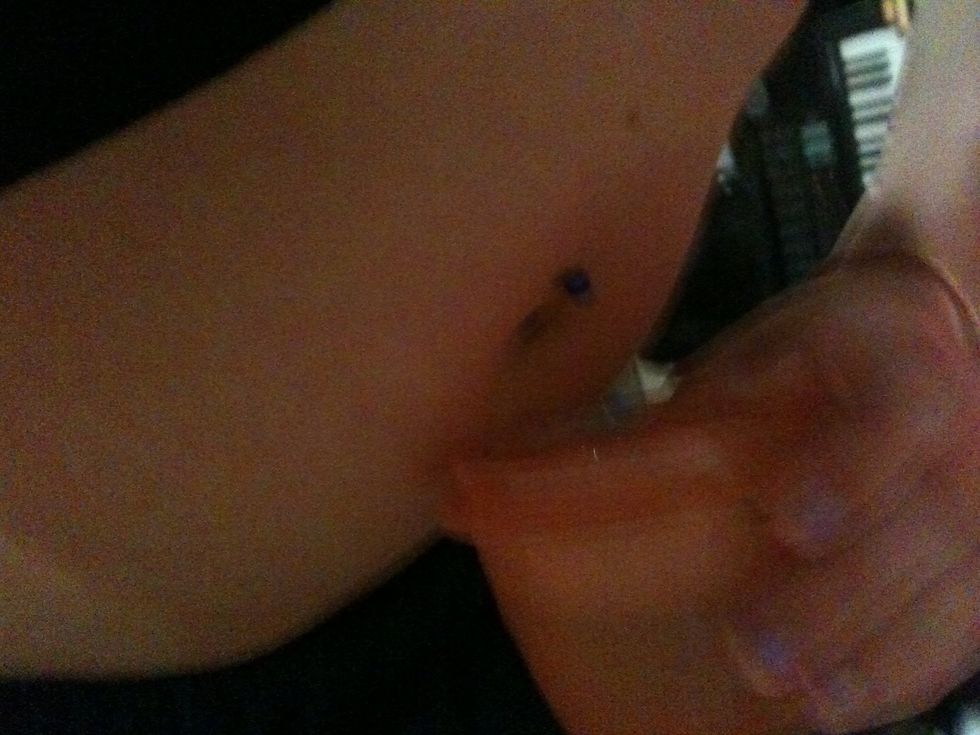 Lean FAR forward and press the cup to your belly button