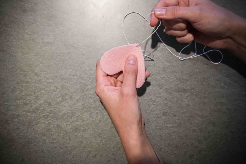 Leave a loop big enough to thread through.