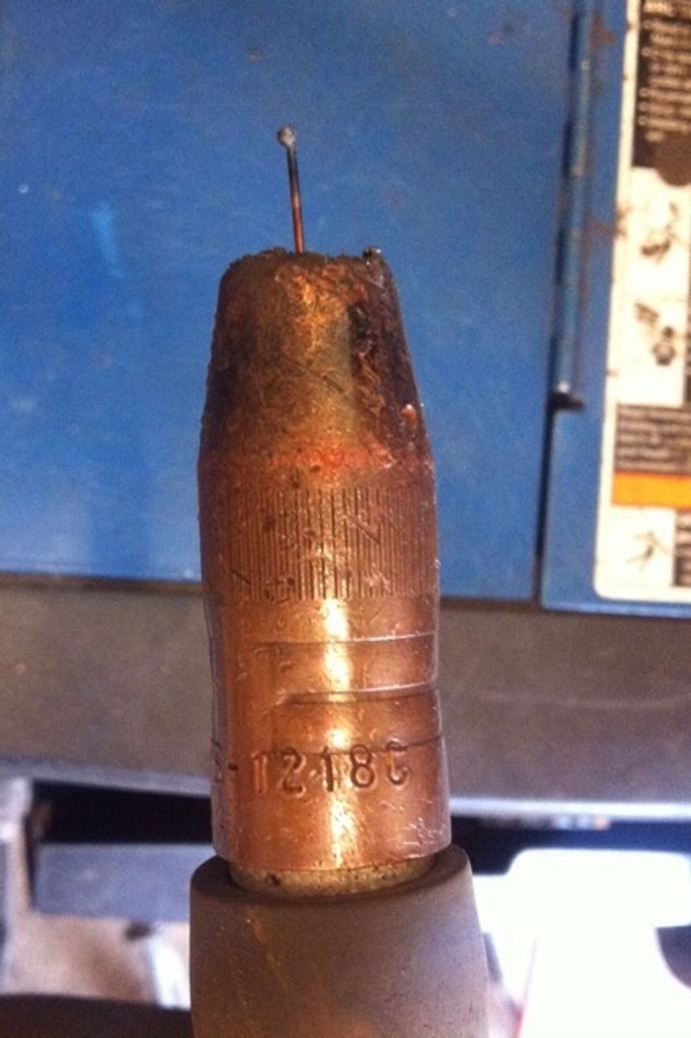 Leave about a 1/4 in of stickout while you are welding, stickout is how much wire is sticking out of the nozzle.