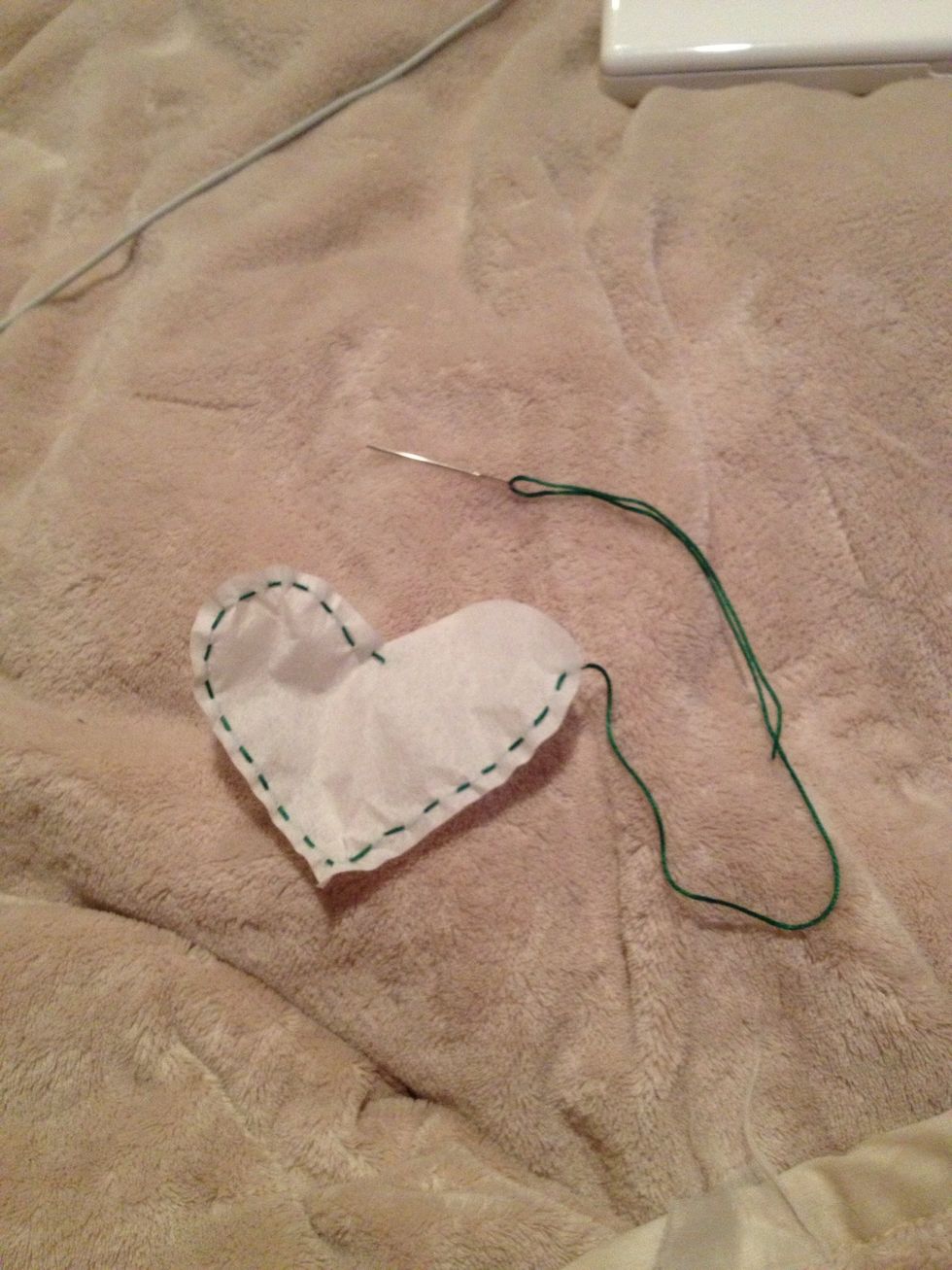 Leave enough room unstitched for your teaspoon to get in. The smaller the teaspoon the better! Don't leave a huge hole because you're more likely to lose tea as you finish stitching.