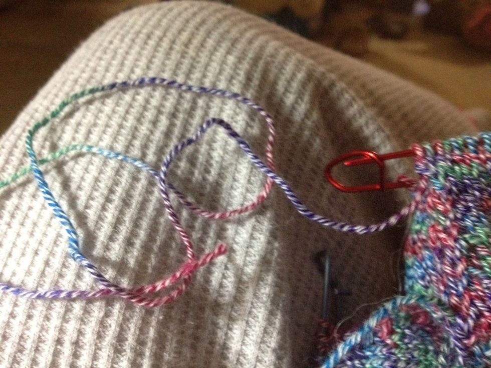 Leave enough yarn when you finish your puff to work the graft stitches comfortably. I leave about a 15-inch length of yarn with which to close the puff, and then use remainder to join puffs together.