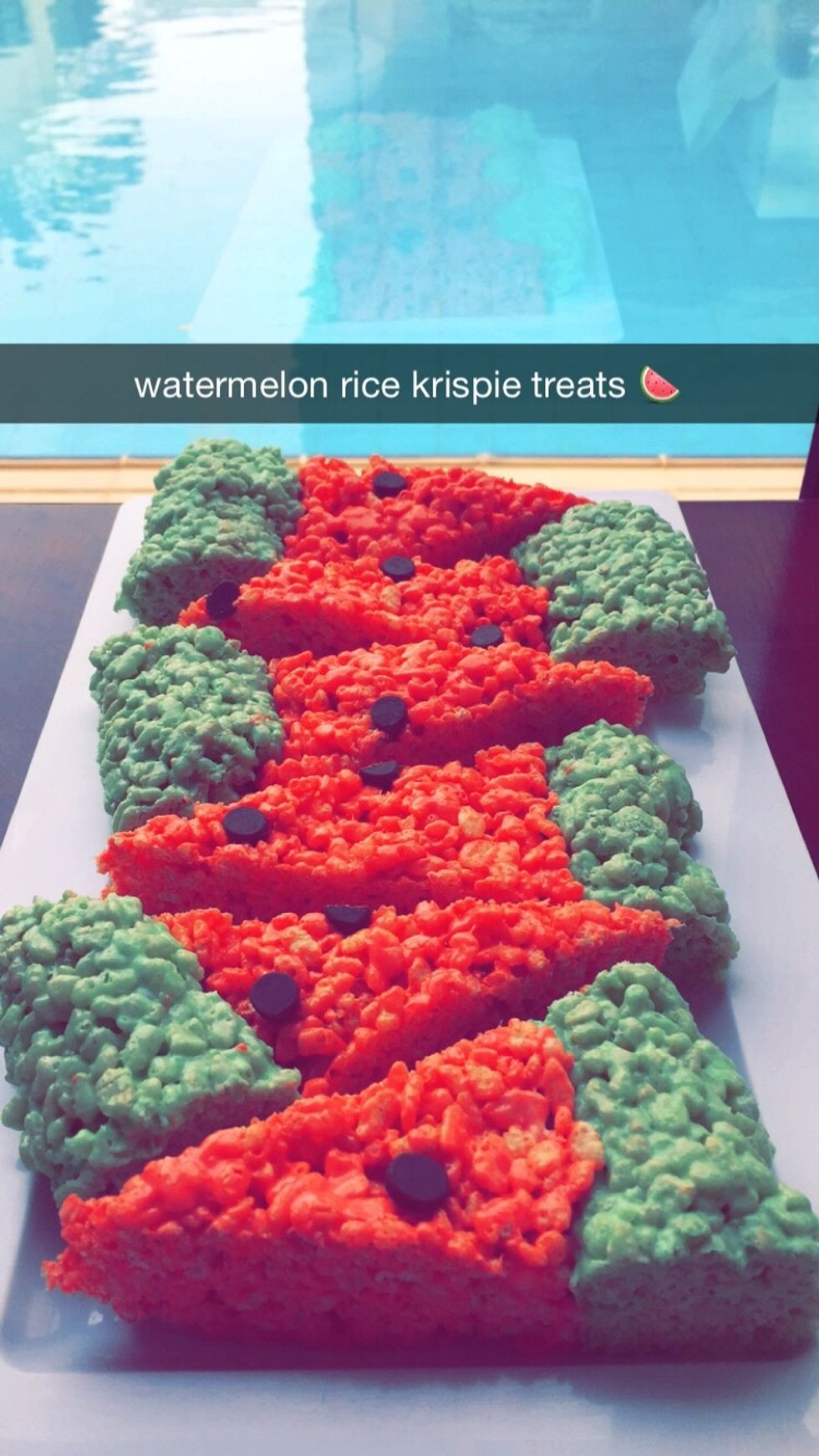 Leave it to set for a bit, cut it up, then there you have it - watermelon Rice Krispie treats! yum!