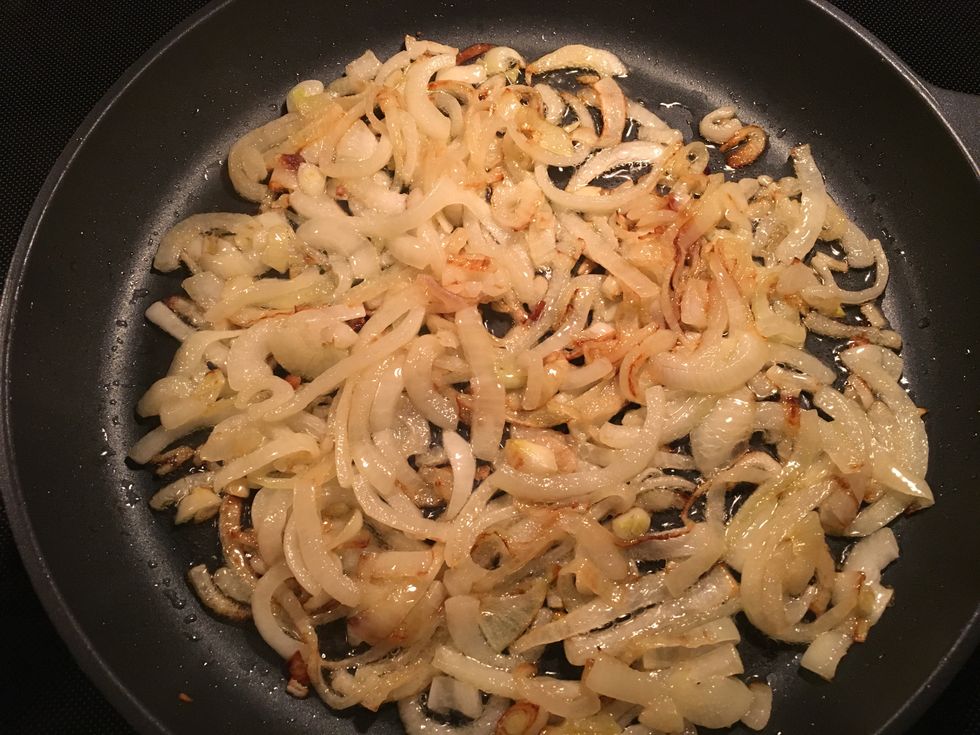 Leave onions to cook slowly and stir so they are even. Continue stirring onions until they become golden brown and caramelized.
