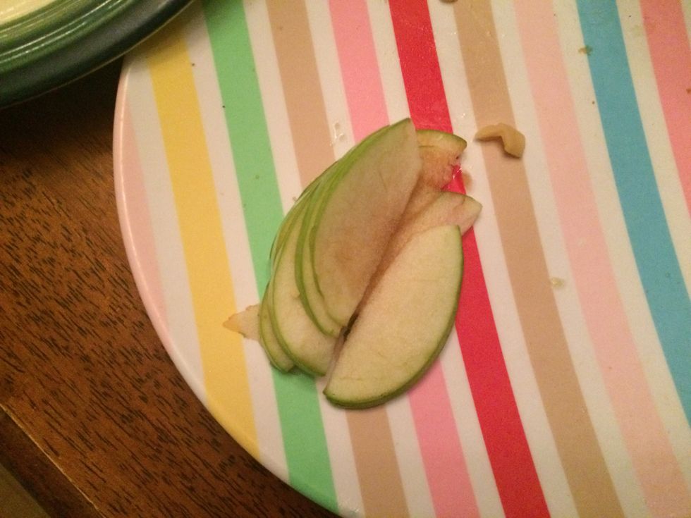 Leave out about four very thinly sliced apples that we will use later as decoration on top of the pie.