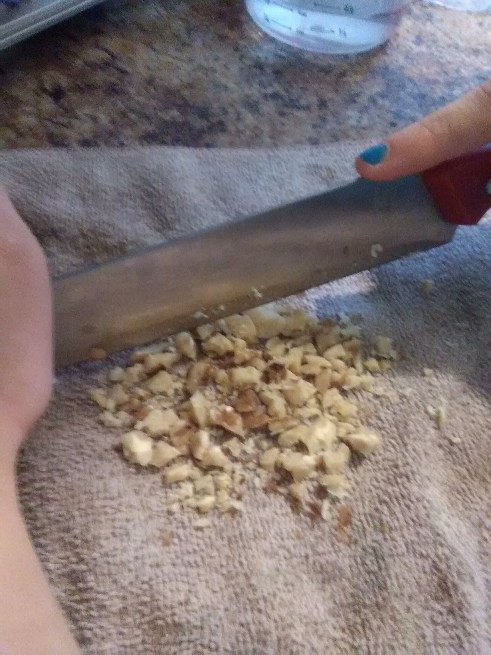 Leave six walnuts unchopped then chop the rest
