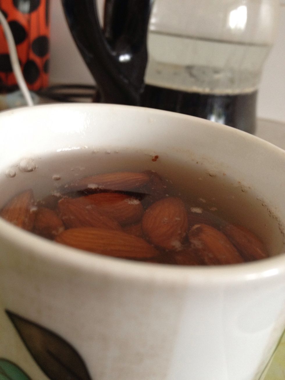 Leave the almonds to sit in the hot water until it has cooled.