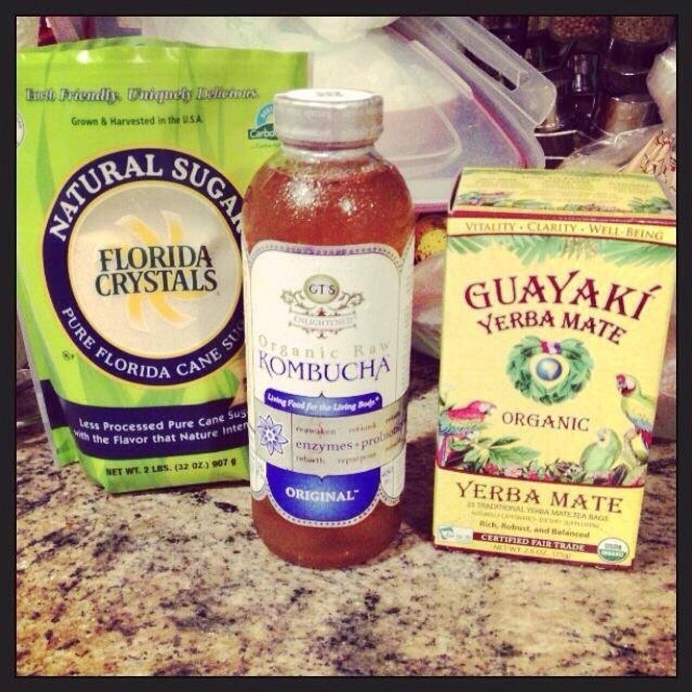 Leave the kombucha out until it is room temperature. In a metal pan boil water & sugar until completely dissolved (approx 5 minutes) add tea bags & stir an additional minute or two.