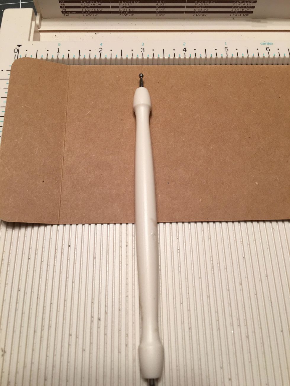 Leave the tag on the Scor-board and also score at the 3 inch mark. You will do this to only ONE large tag to create the wrap around cover.