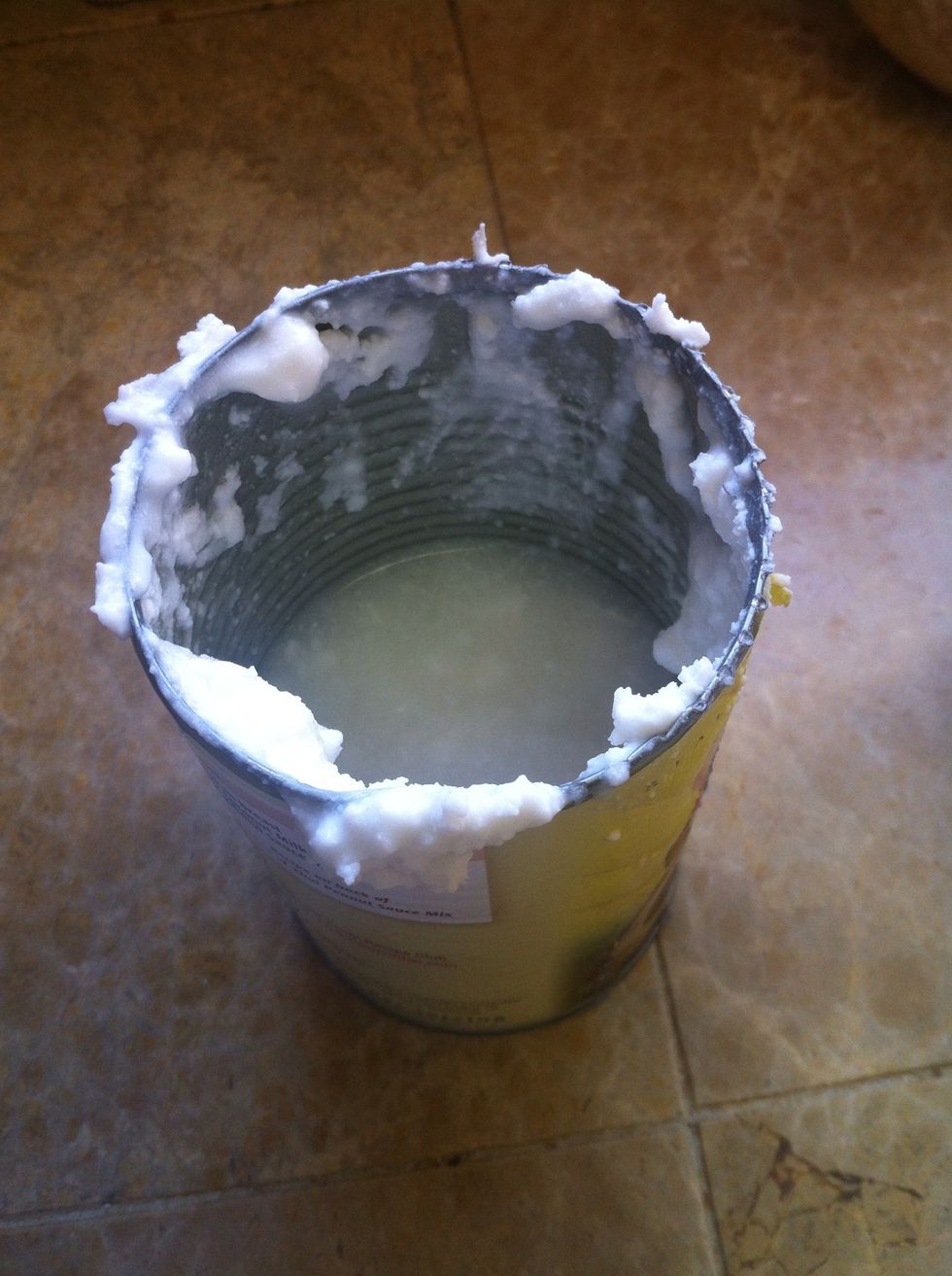 Leave the water in the can.... You can either throw it away or use it for extract or something. :)