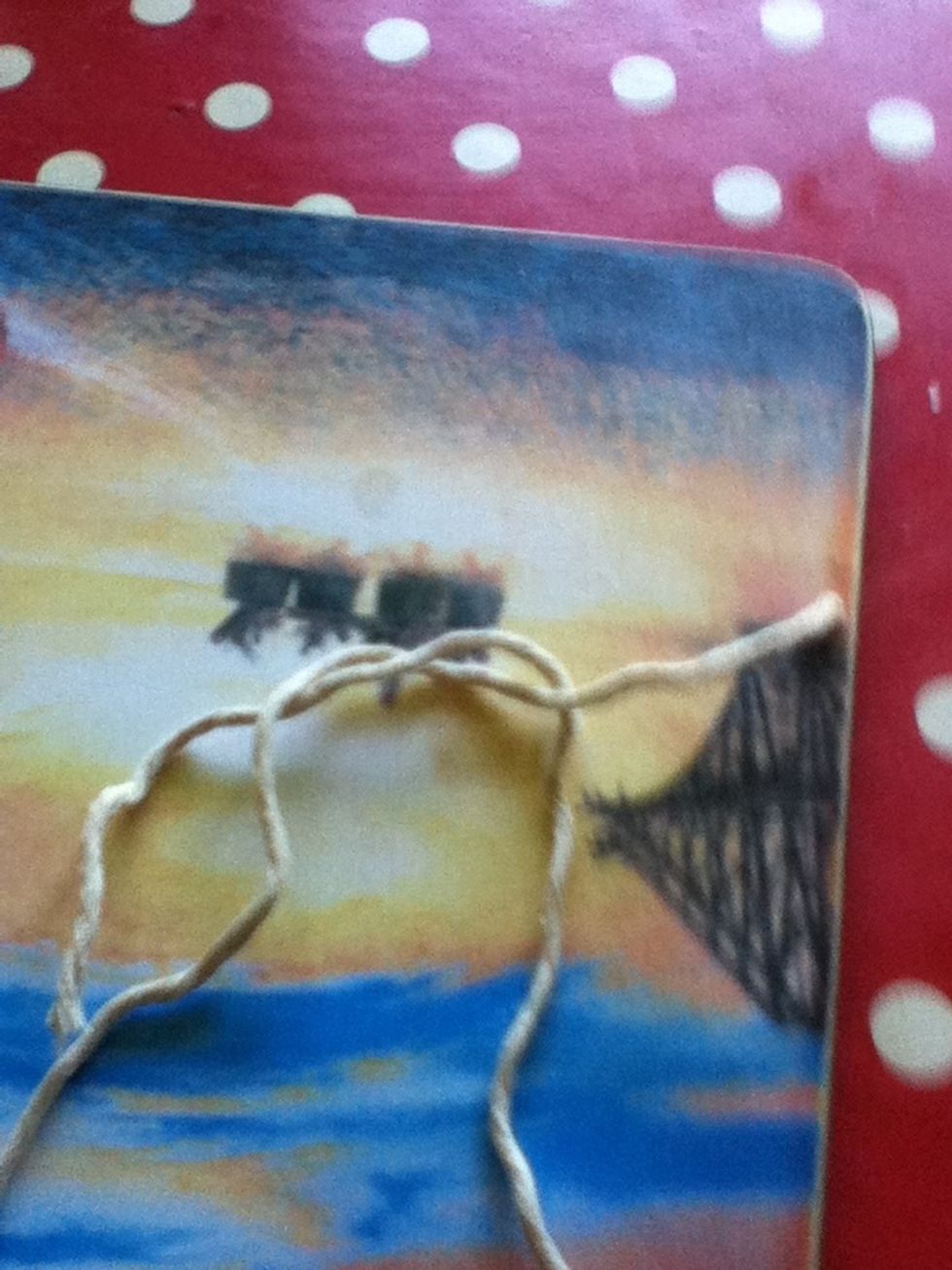 Left side over the right side and then tuck underneath like so