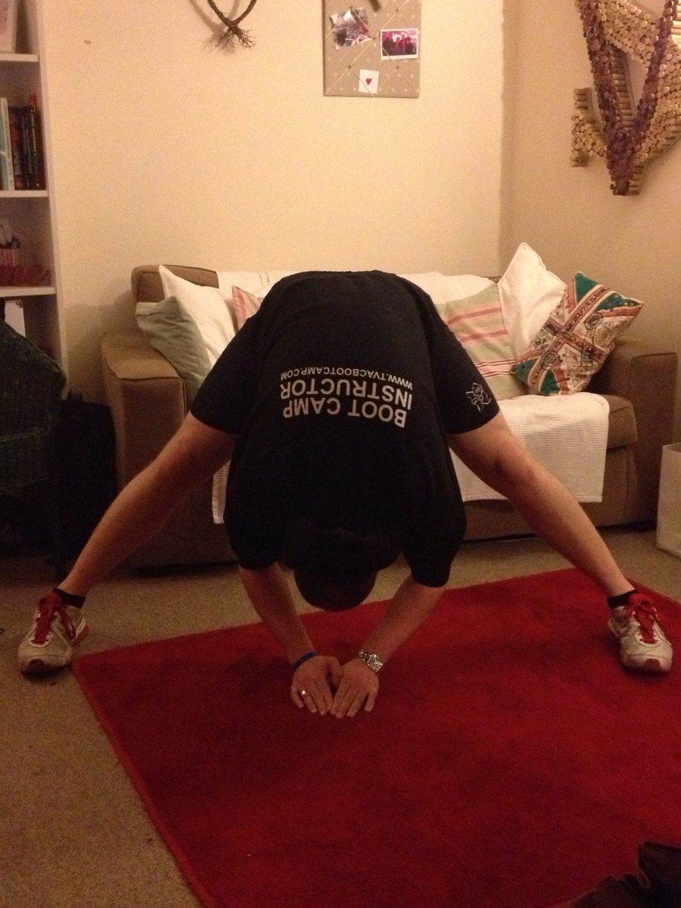 Legs wide apart and hang to the centre... Do not bounce as it puts added strain on your muscles during the stretch