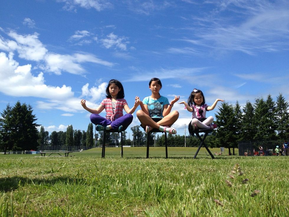 Let all kids sit on a stool and take the first photo. You can turn on self timer control or sound control in levitagram, so you don't need to touch the iPhone when taking photos.