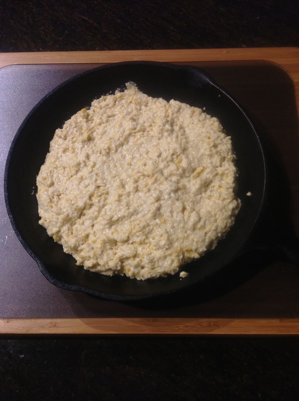 Let batter rest 1 minute then spread evenly into skillet.  Place in oven and bake 25 minutes or until toothpick inserted into cornbread comes out clean.