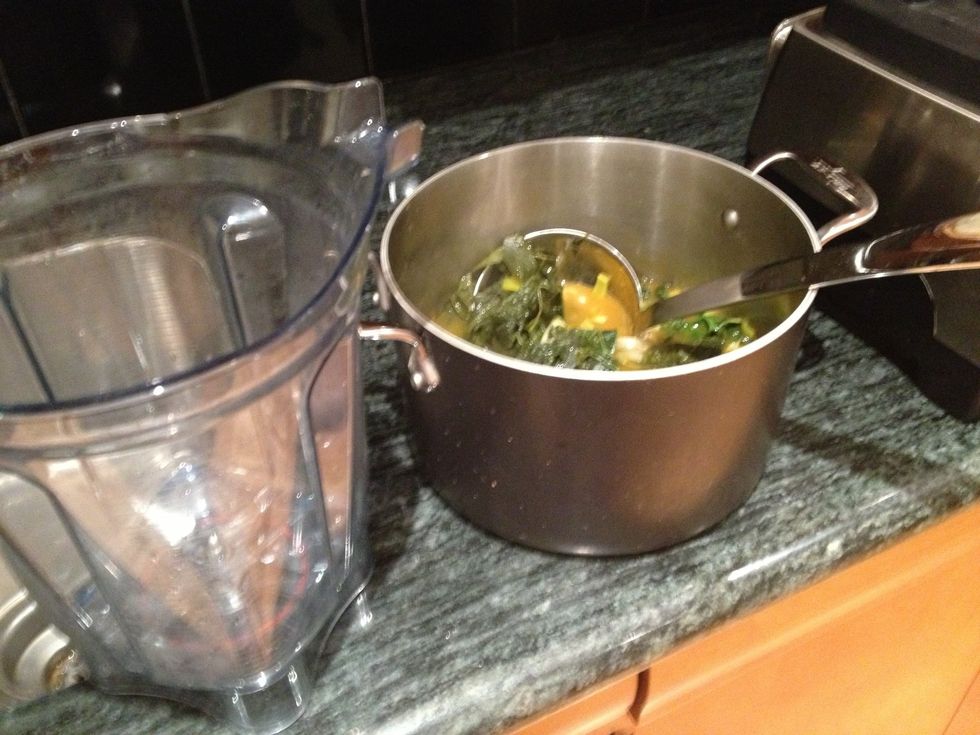 Let cool a bit, and then ladle the soup into a high power blender, such as a Vitamix. Work in batches.