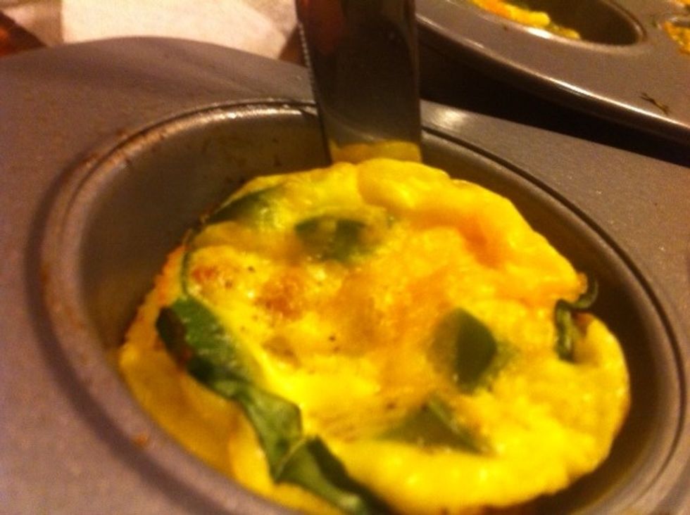 Let cool about 10-15 minutes. Then can take a knife and cut around the cup to help loosen for easy removal.