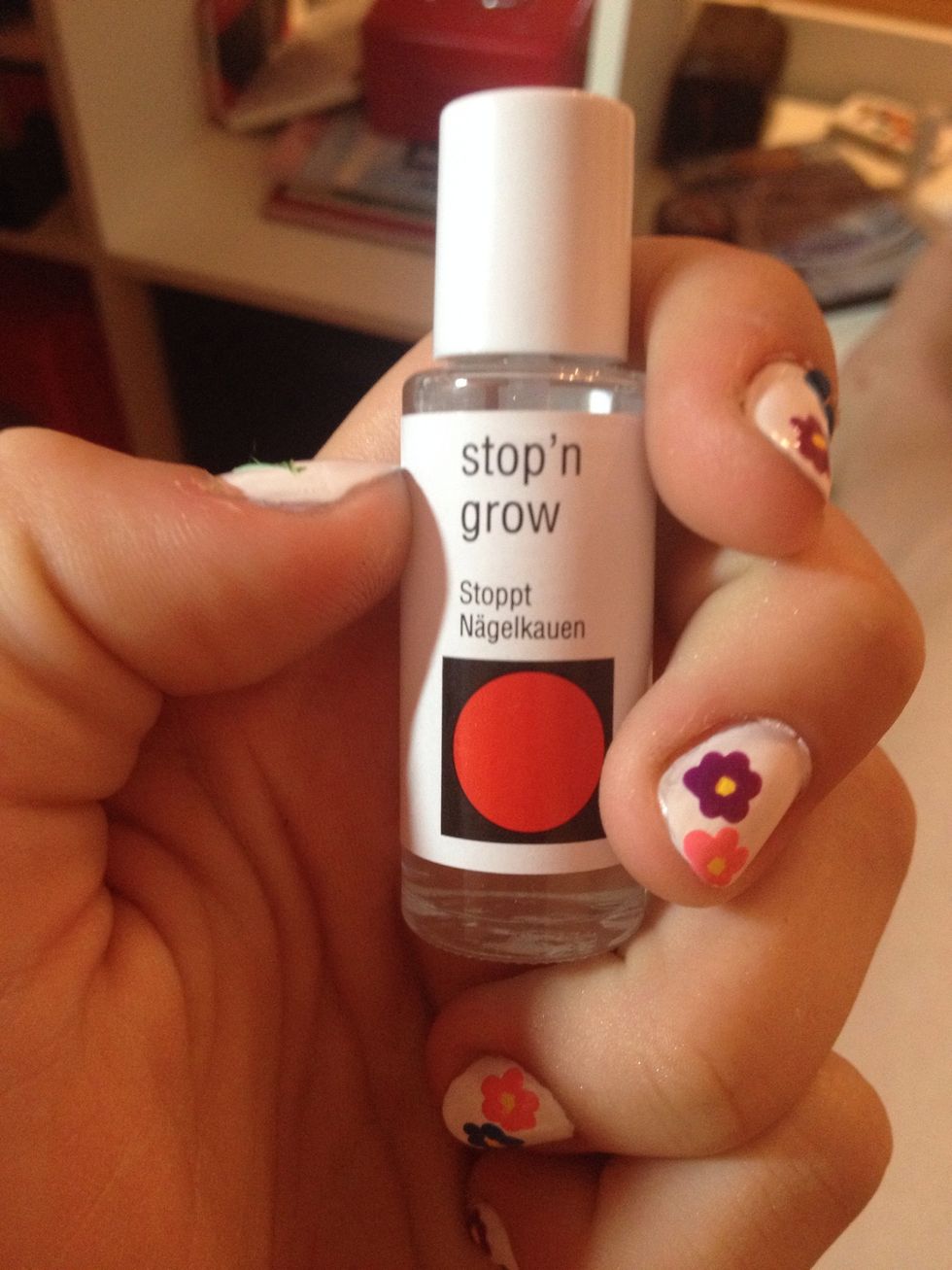 Let dry completely, then top coat. For me it's stop n' grow, a clear polish with terrible bitter taste because I tend to bite my nails.