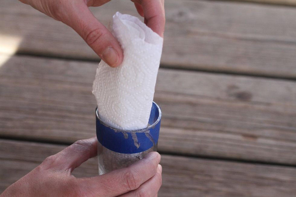 Let dry for at least one minute, then lightly blot the inside of the glass to soak up any remaining water and remove any puddles of paint. Too much rubbing will remove the paint, so be gentle.
