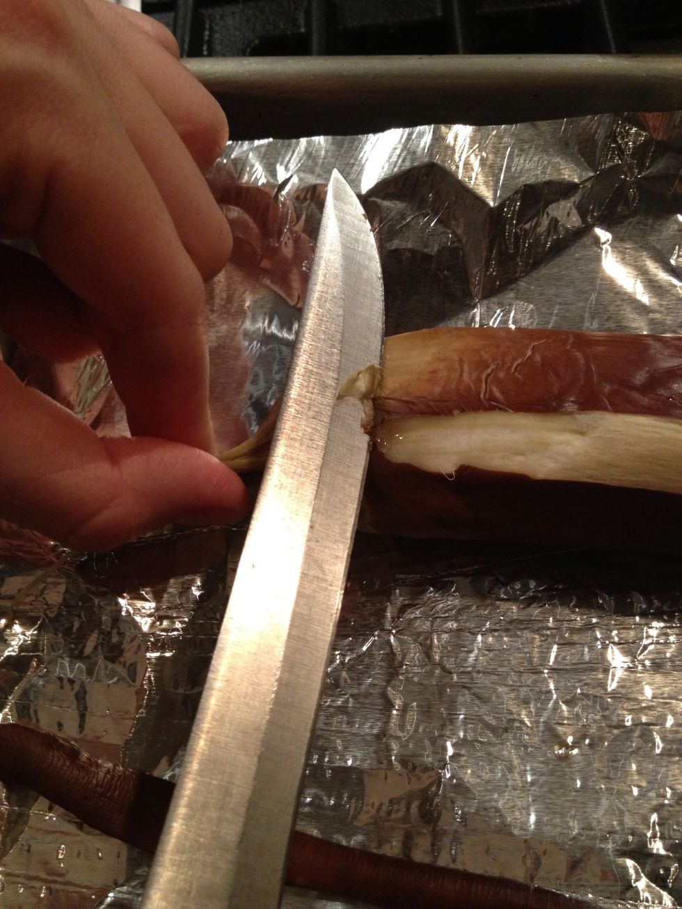 Let eggplants cool before slicing and peeling the skin off.