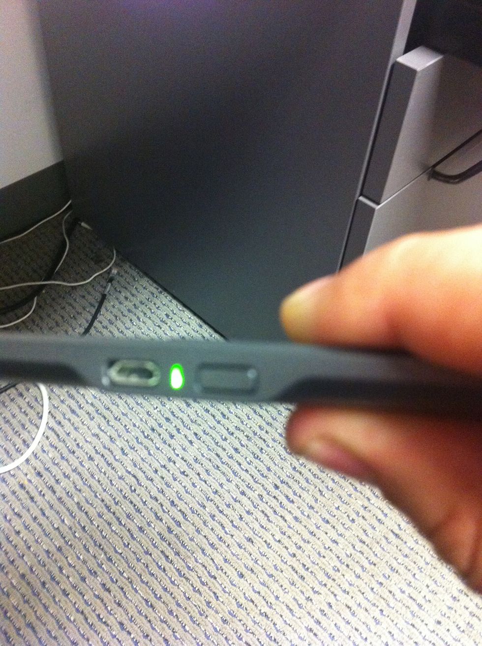 Let go after 20 full seconds. Shortly after you let go, the green light will illuminate again.