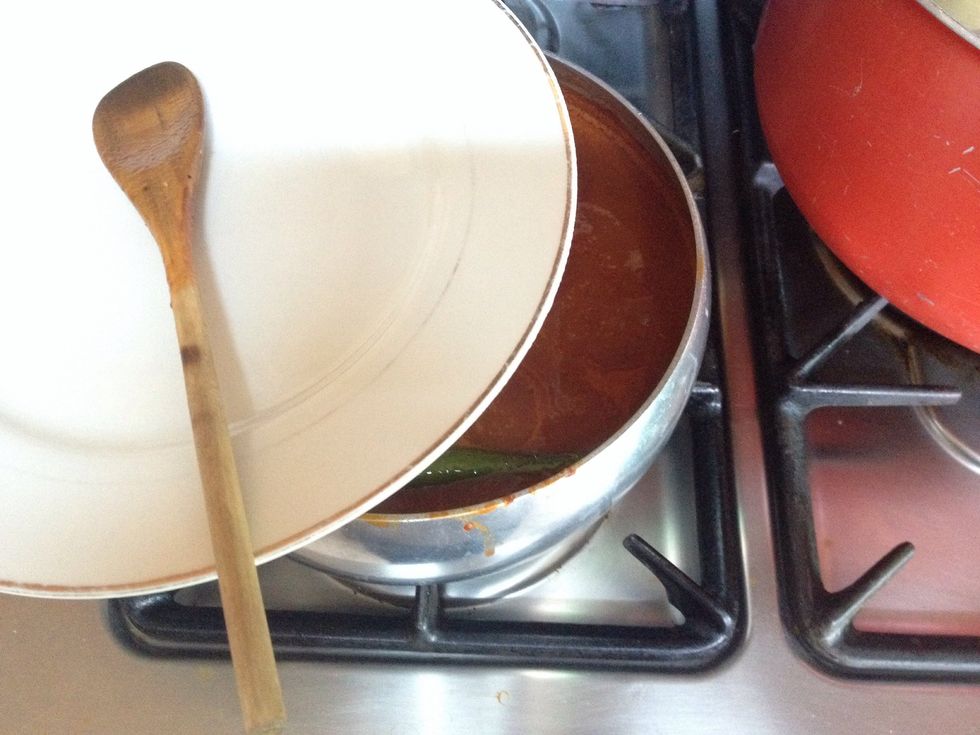 Let it boil at extremely low heat, stirring it ever once in a while, until the beans take up the taste of the sauce.