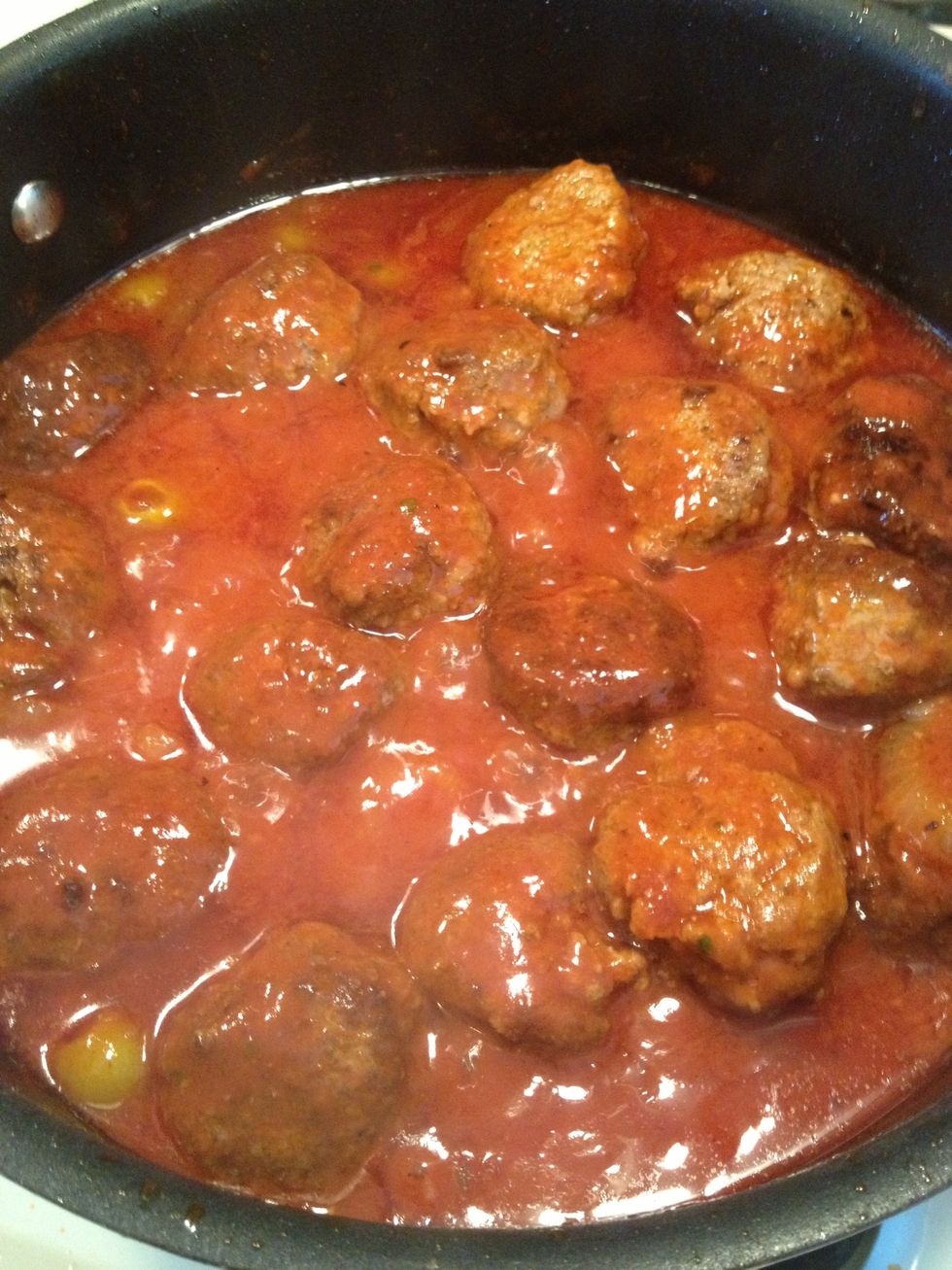 Let it cook until the sauce has thickened and reduced to half.