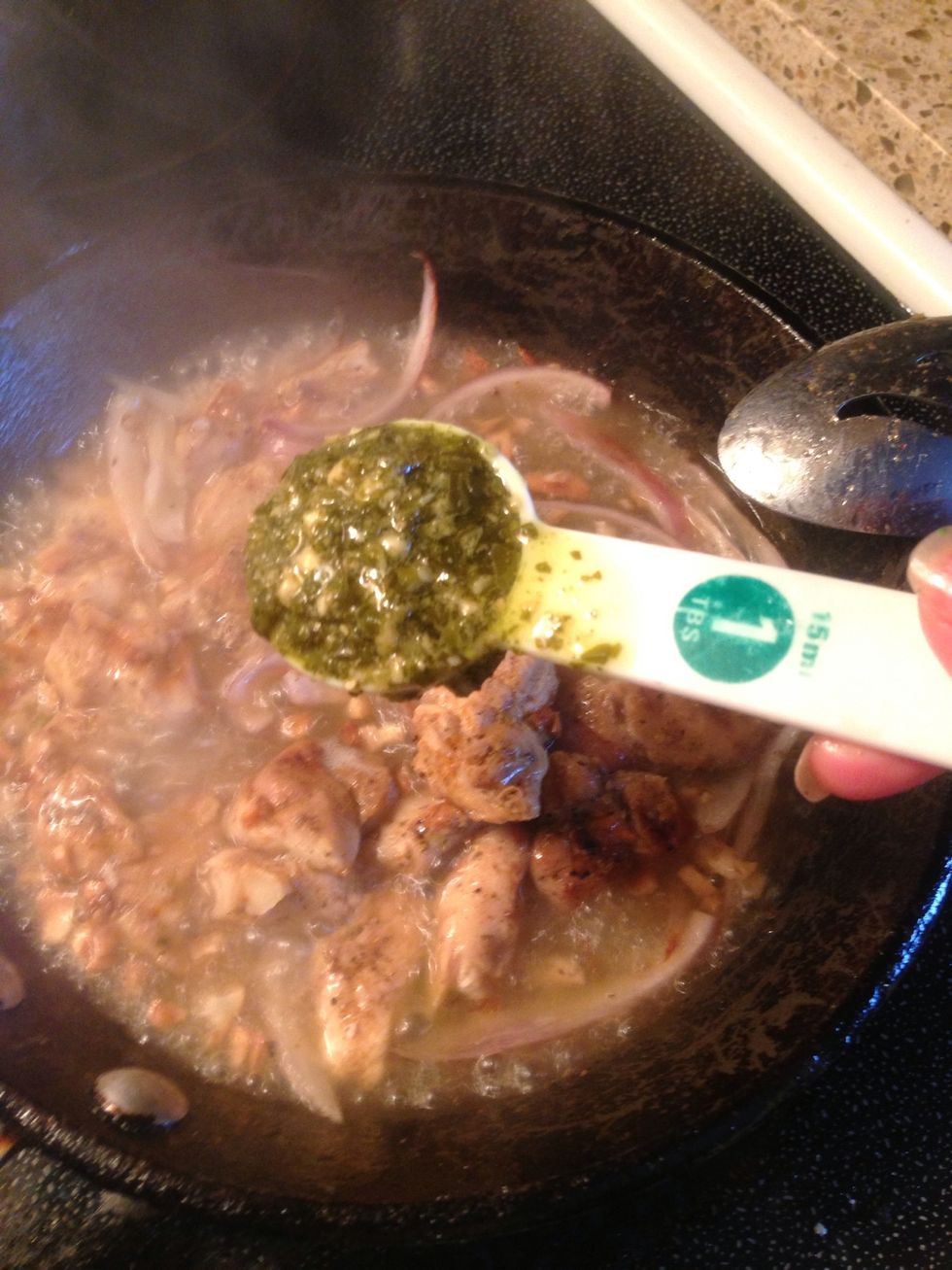 Let it simmer and add your 2 1/2 basil pesto sauce and mix it for about 2 minutes. Adjust your heat to low after 2 min. Then get ready to add your drained and cooked pasta rotini