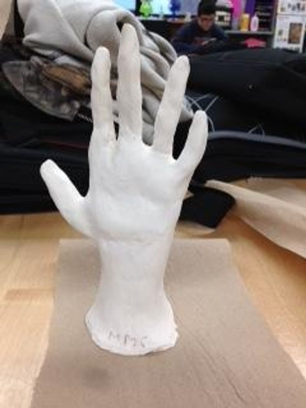 Let it sit out to dry. after dried put it through the kilm