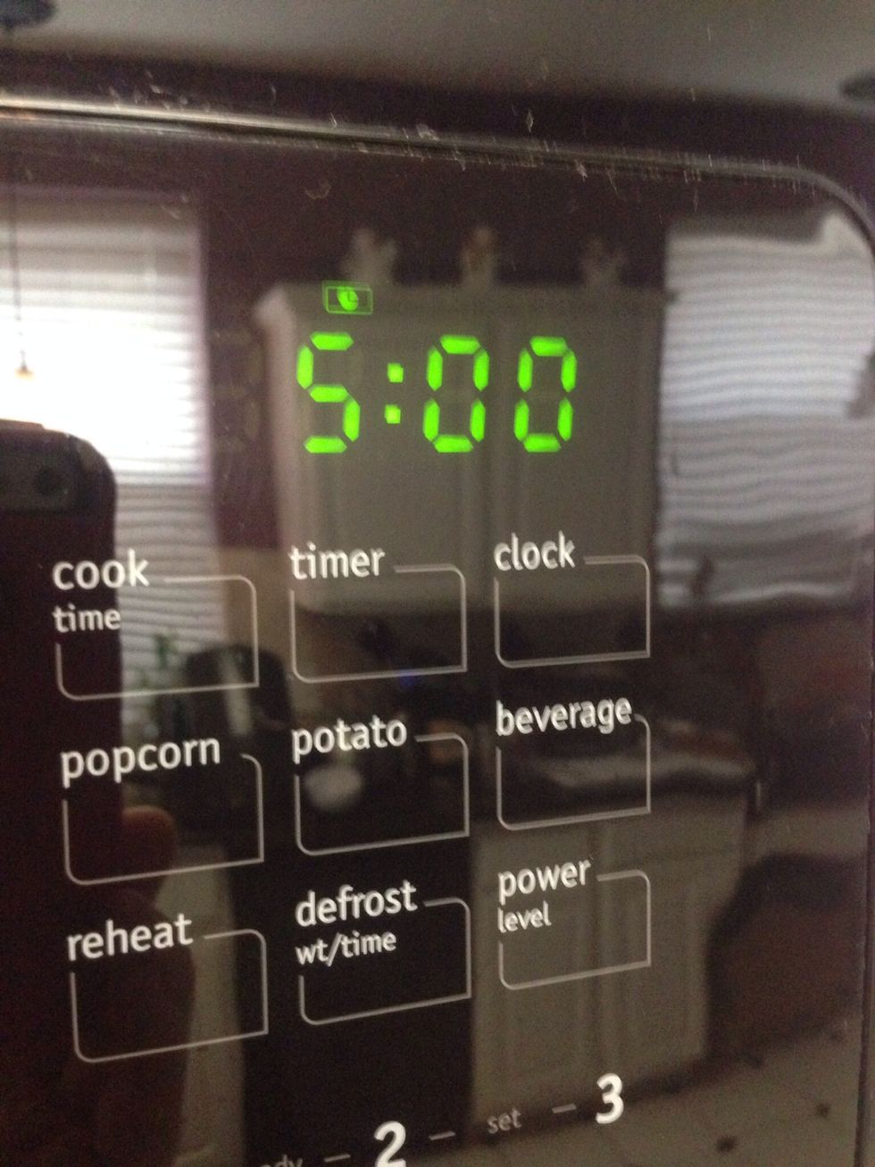 Let jars sit in boiled water for 5 minutes. Then remove to a drying rack.