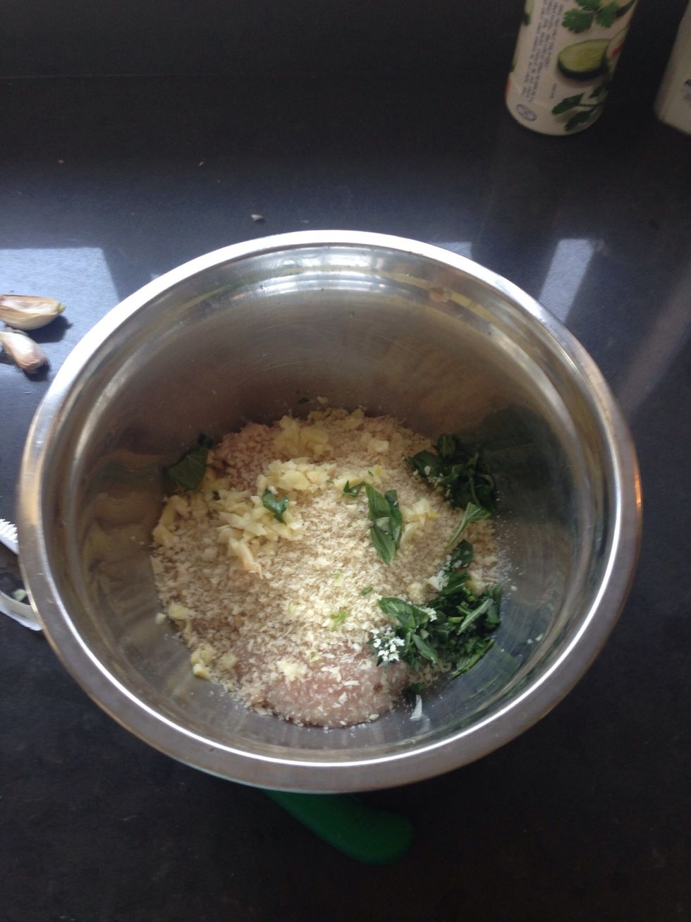 Let prepare the chicken mix - minced chicken, a few chopped basil leaves, 2 garlic cloves, bread crumbs (I use Panko personally), 1 grated onion, salt & pepper