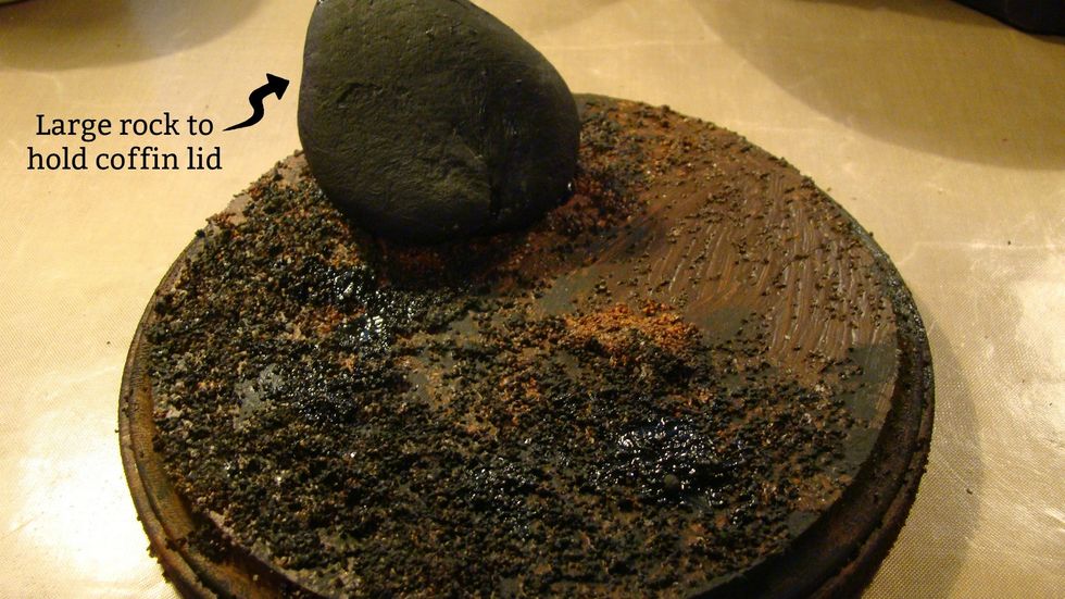 Let's add a bit more depth and texture with sponging on Black Lava. Glue your coffin and lid into place on platform.