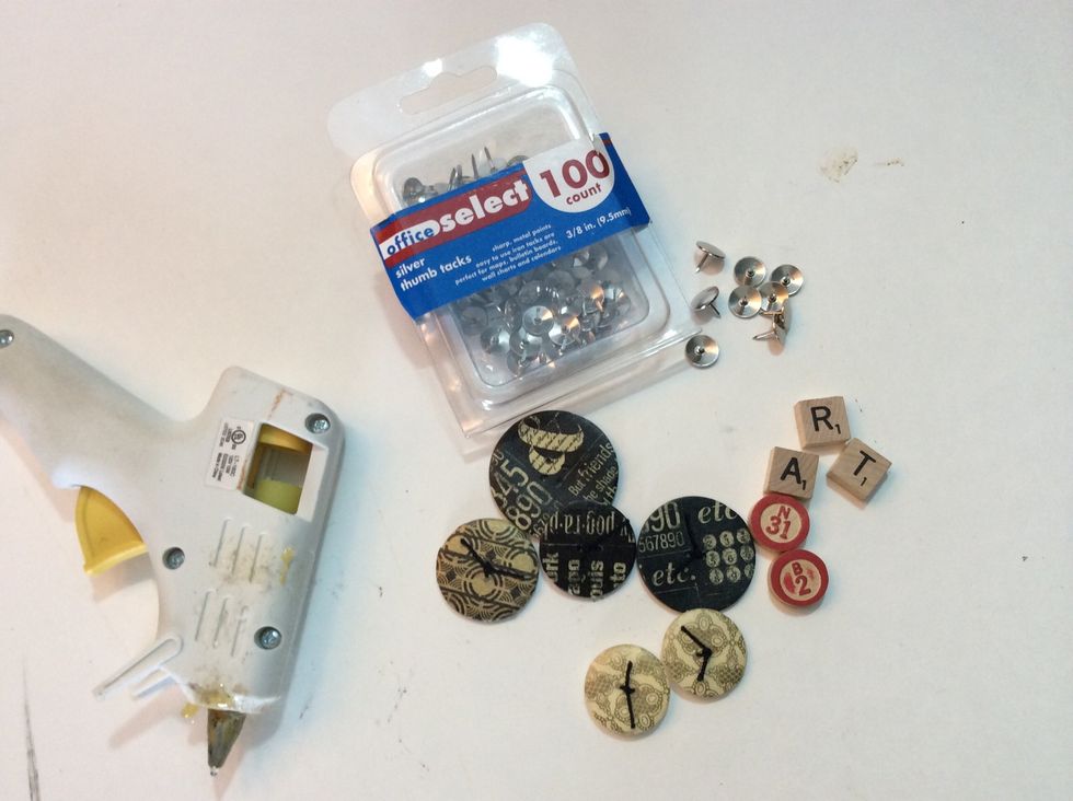 Let's create some pins to use on our pin board... We'll use washi covered buttons (see my guide on how to make these right here on Snapguide!), game pieces, hot glue and plain old thumb tacks.