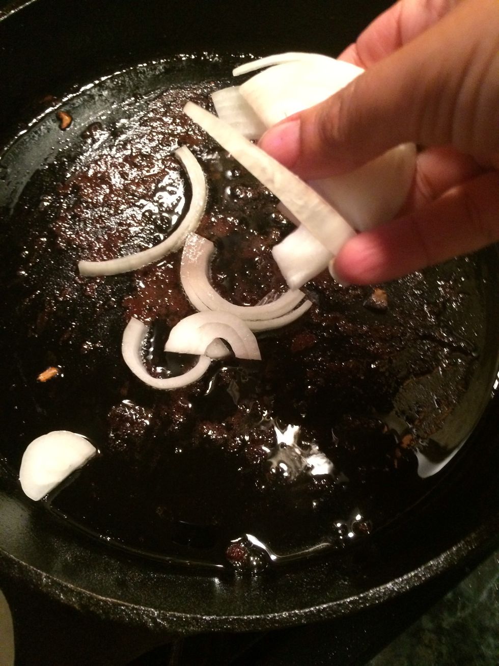 Let's do the same to the onions. If needed add a tbs more of oil. Cook the onions for a few minutes. DO NOT overcook the onions. They will continue cooking in the gravy.