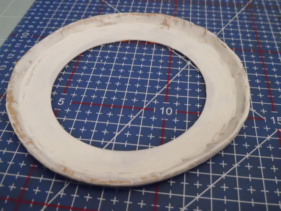Let's get messy! Apply texture paste to smooth over any remaining edges. We're not after a glass flat finish but give it a quick sanding once dry. This is much easier to do before assembly.