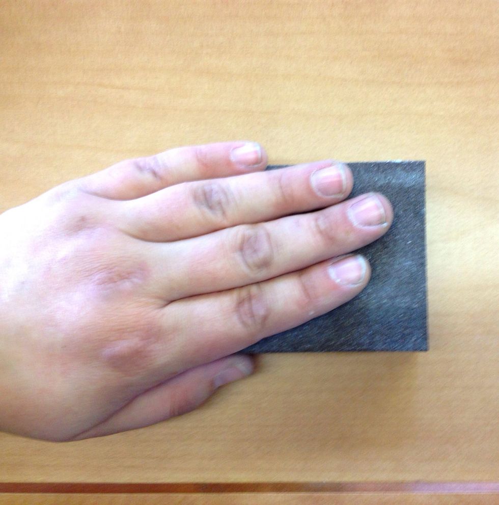 Let's get started! First, sand the panel (with the grain). For unfinished wood, the goal is to sand away any irregularities. For finished wood, you're just roughing up the surface.